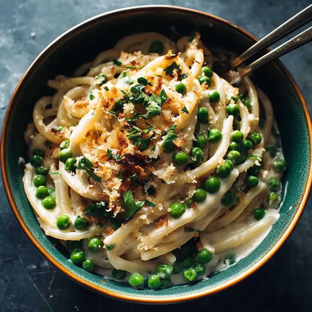 Creamy Garlic Bucatini with Peas and Asparagus Made Easy!